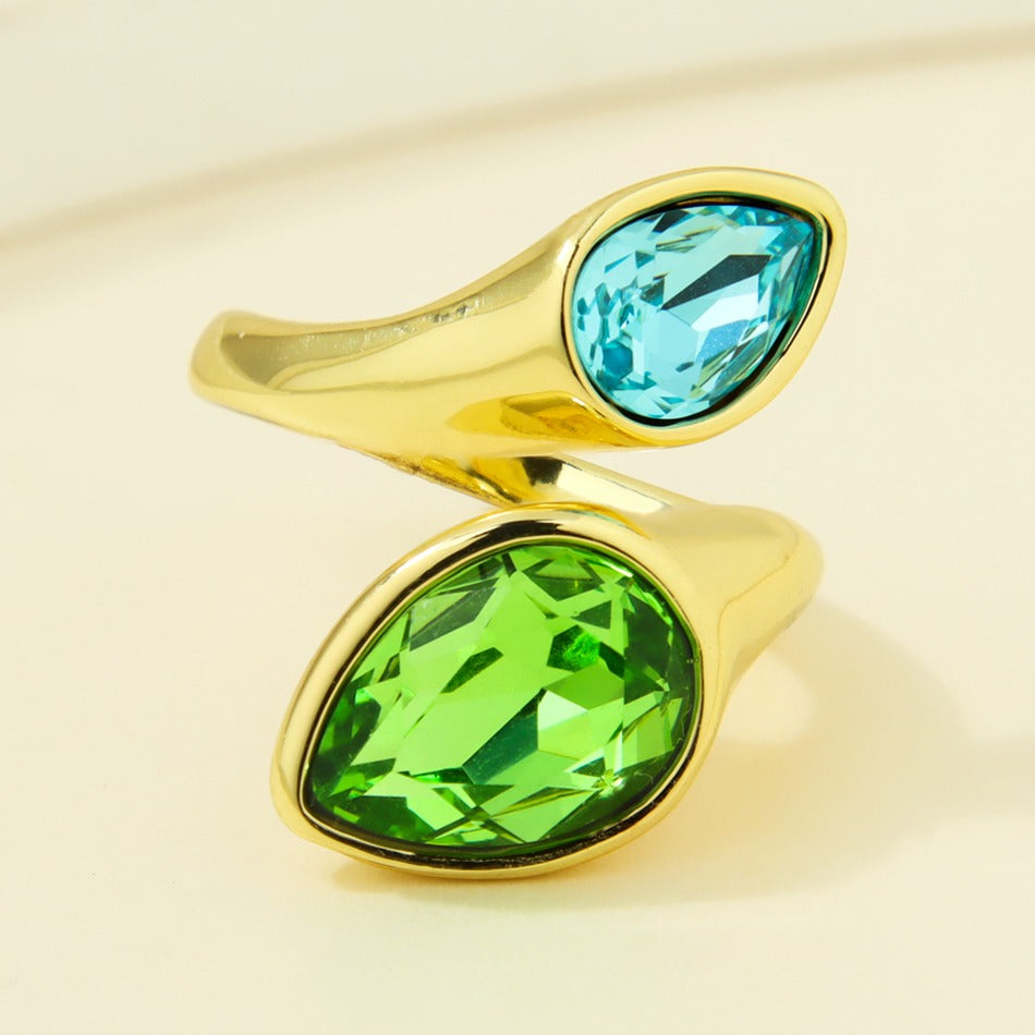 Gold-plated statement ring with aqua and green faceted teardrop accents