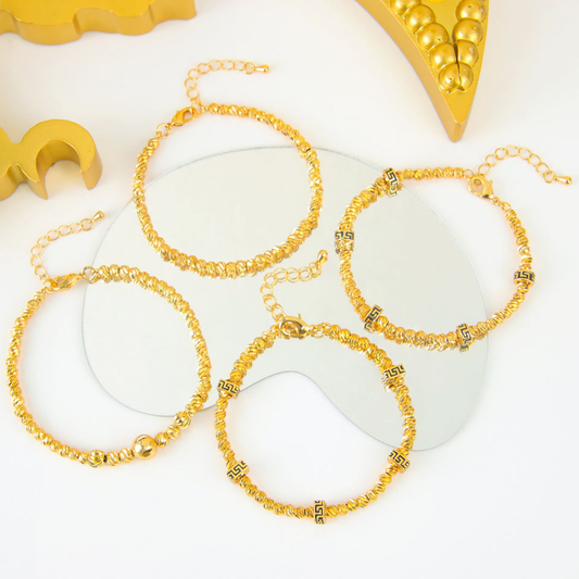 Gold bead charm bracelet — view 2