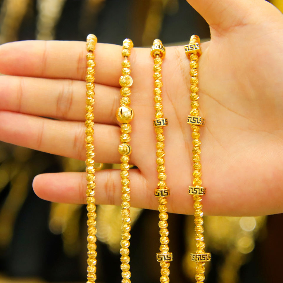 Gold bead charm bracelet — view 5