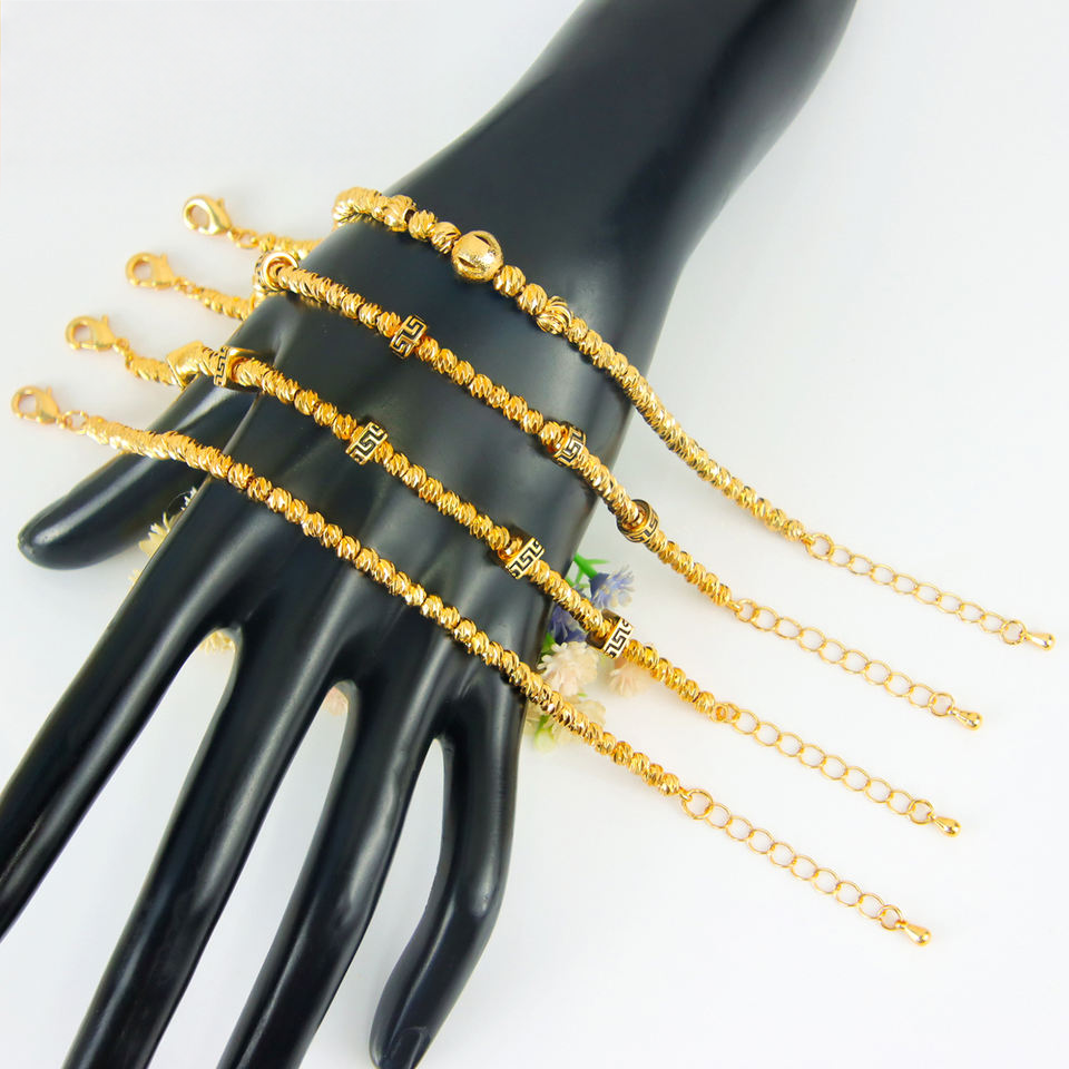 Gold bead charm bracelet — view 6