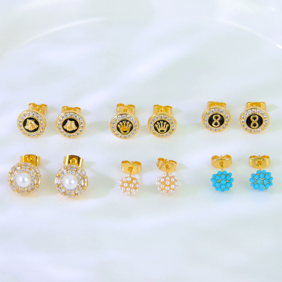 Pearl and zircon stud earrings